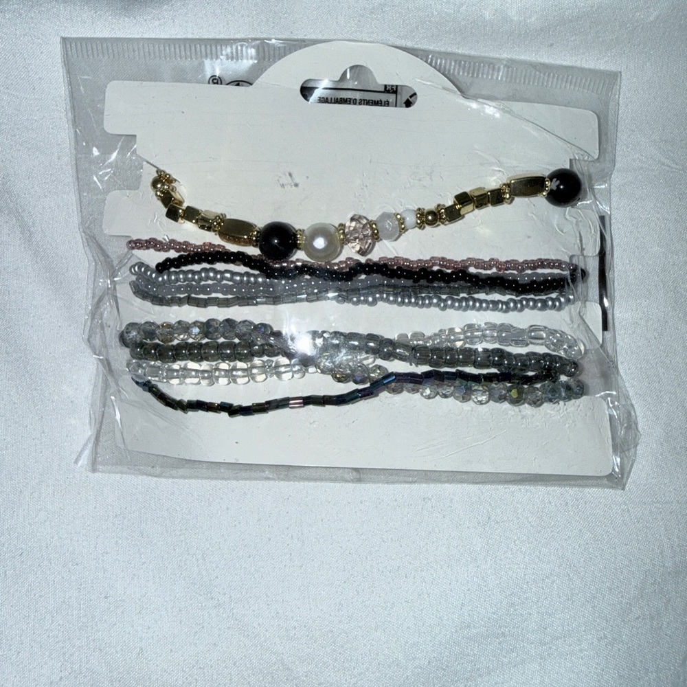 NWT black, silver, white Beaded Bracelet Set